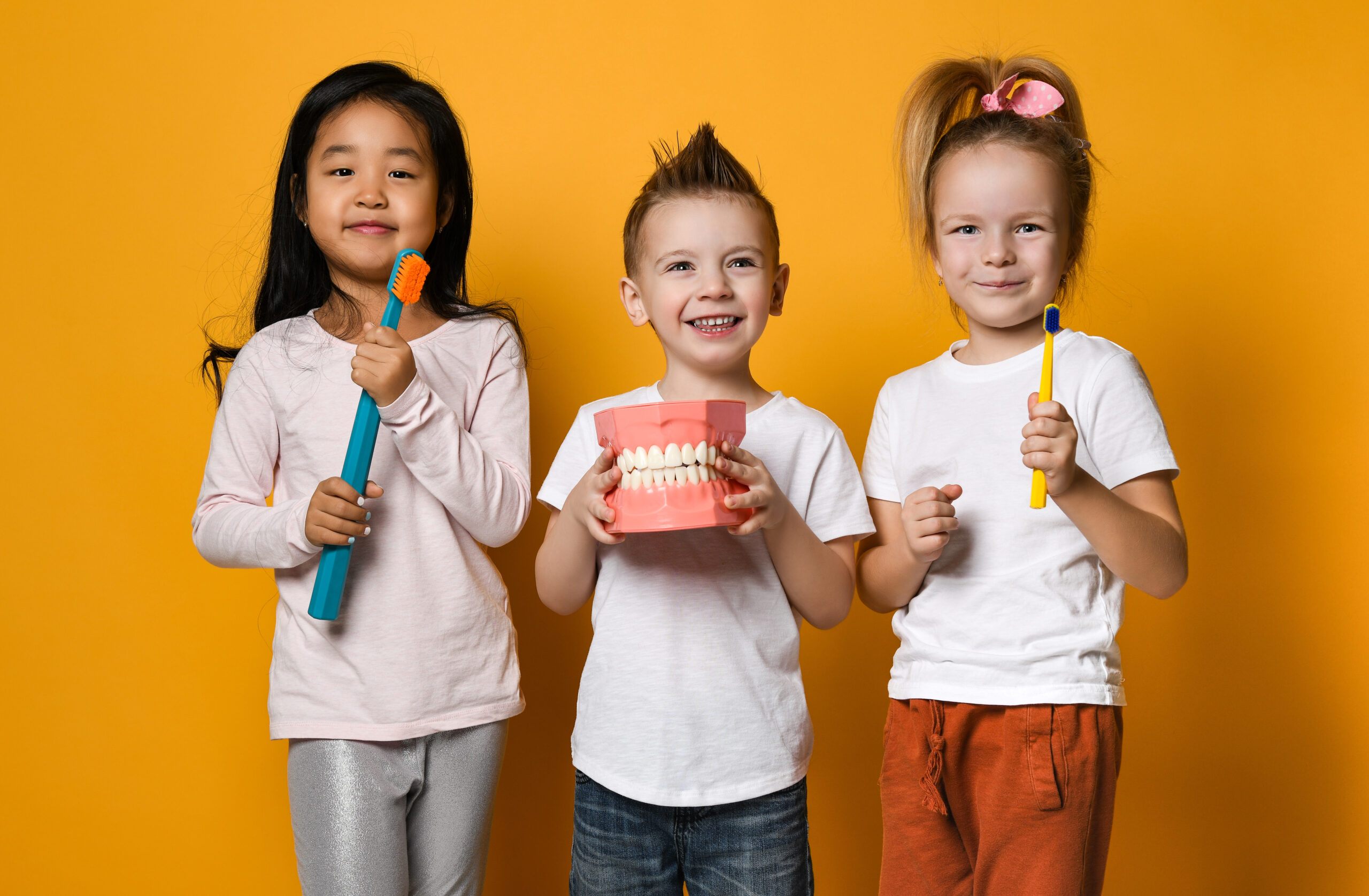 Happy Little Cute Children With Toothbrushes.