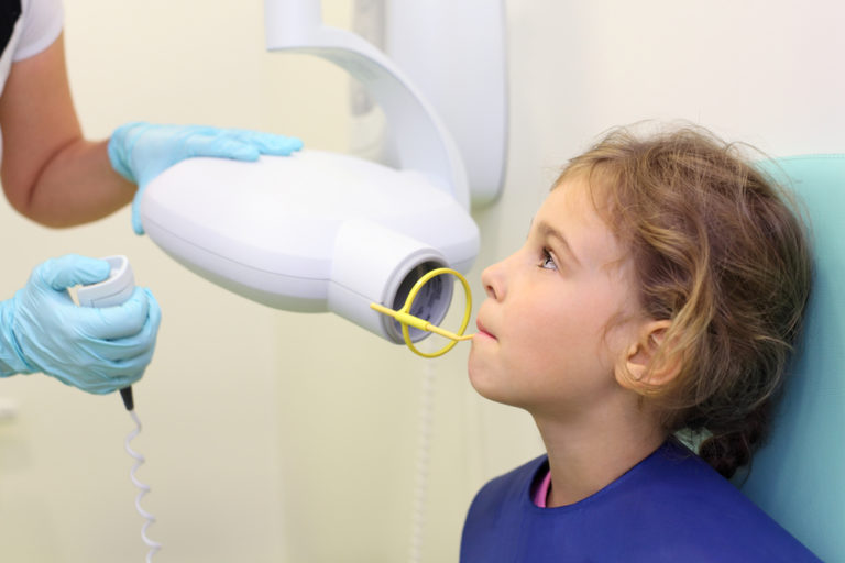 Child gets dental x-rays taken