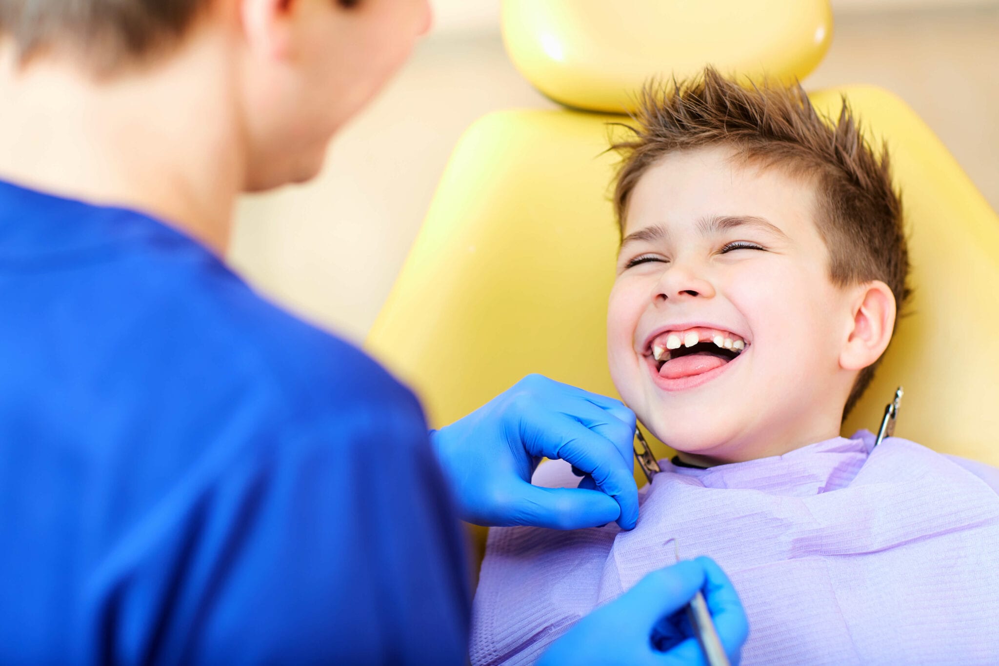Boy is happy at pediatric dental practice