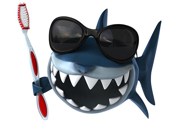 Shark wears sunglasses and holds a toothbrush