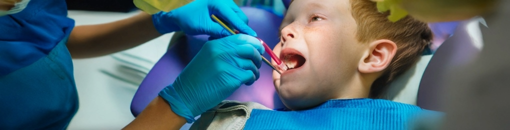 Boy receiving a dental exam